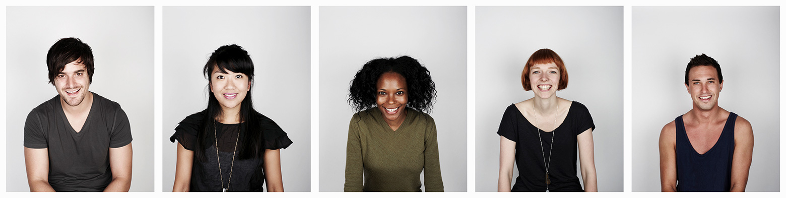 Men and women showing off their pearly whites